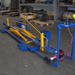 Table élévatrice sur mesure conçue pour extraction de rouleaux
